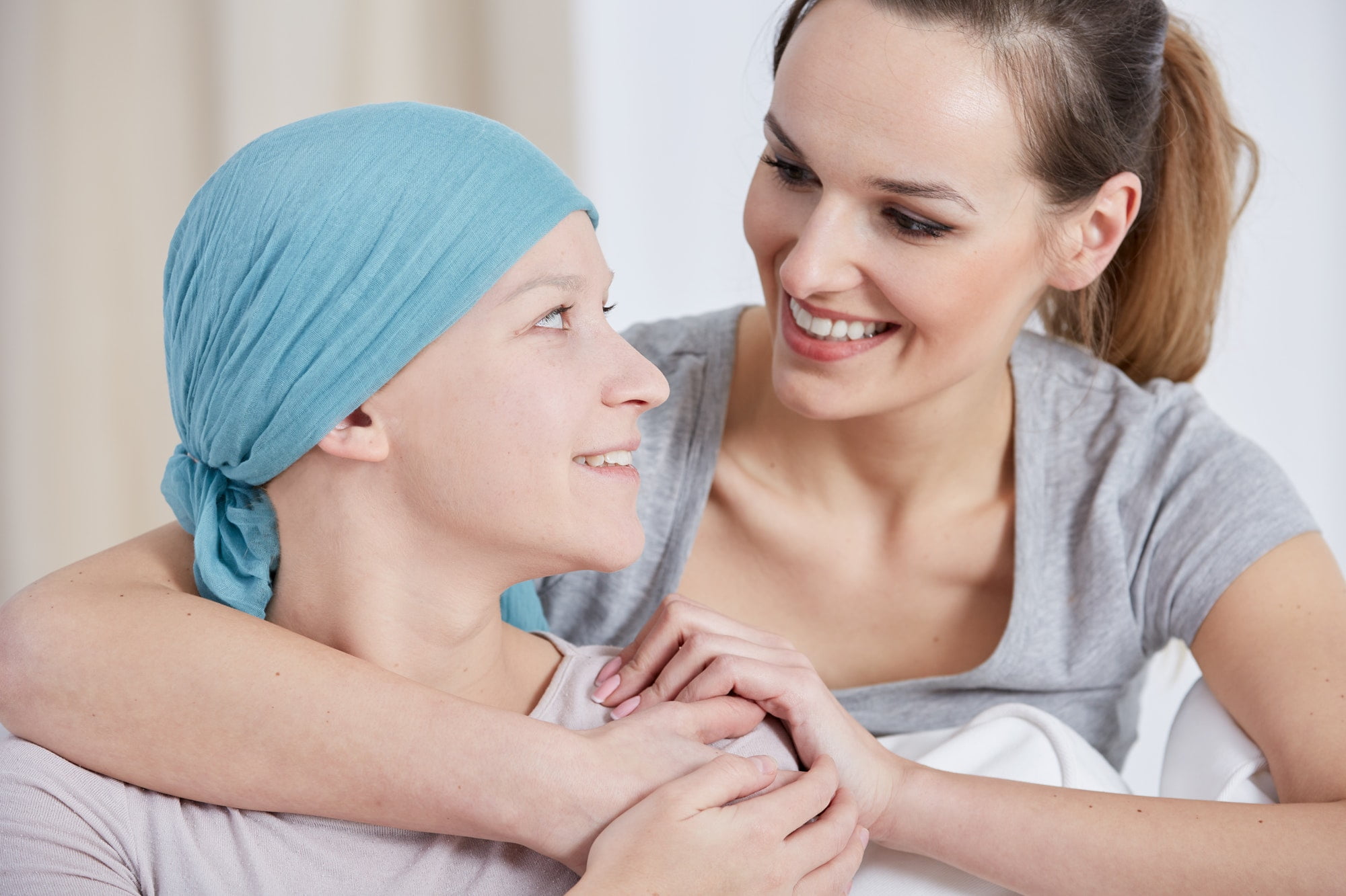 Hopeful cancer woman with friend