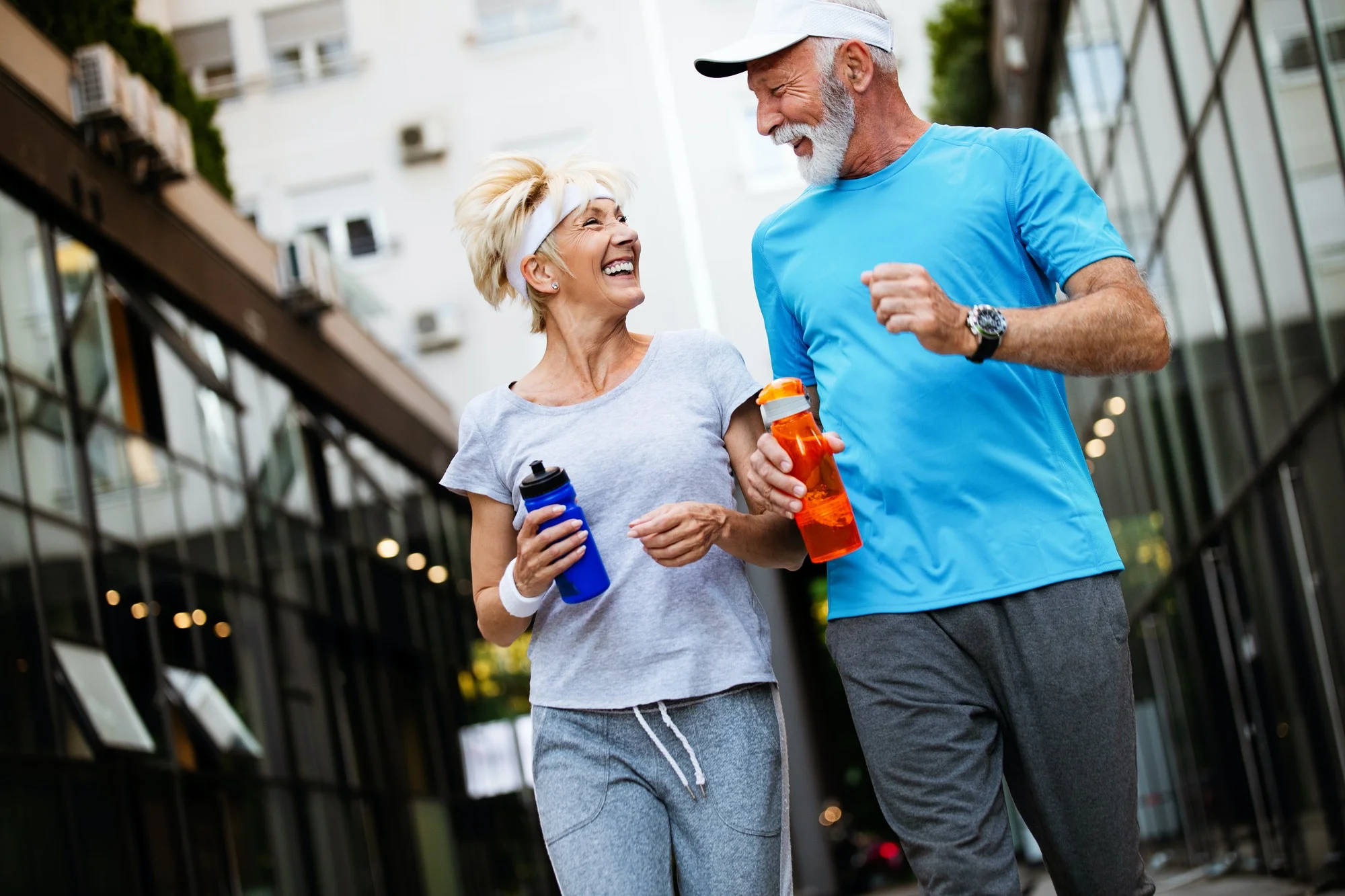 Happy senior people running to stay helathy and lose weight