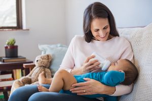 Mother feeding her baby